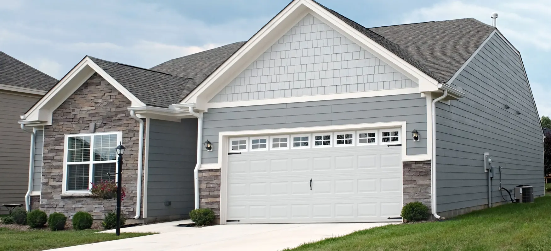 House With Garage And Shake Siding Left Photo