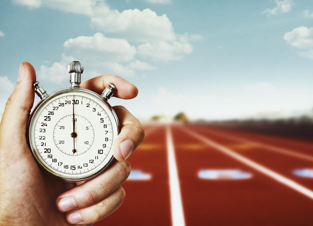 stop watch up close with a track in the background